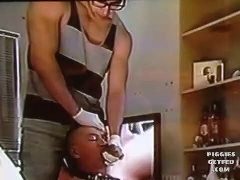Straight young alpha force feeding a slave