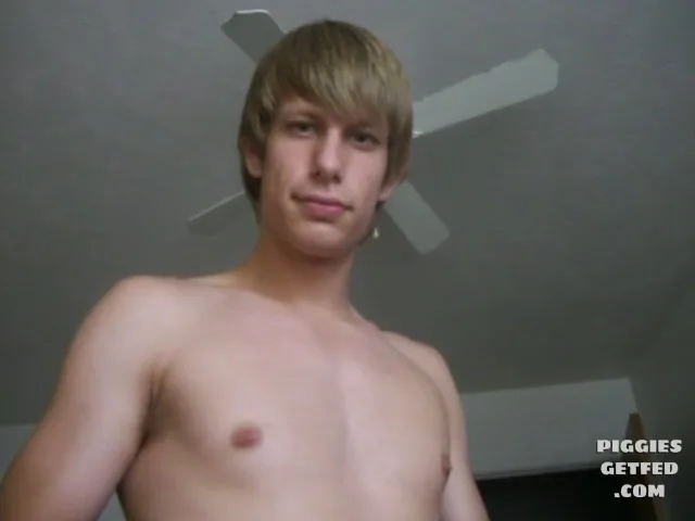 Twink feeder amused by a pig eating his shit