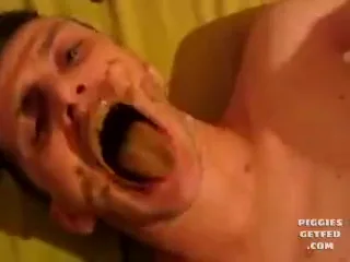 Italian pig eats from beefy man’s ass